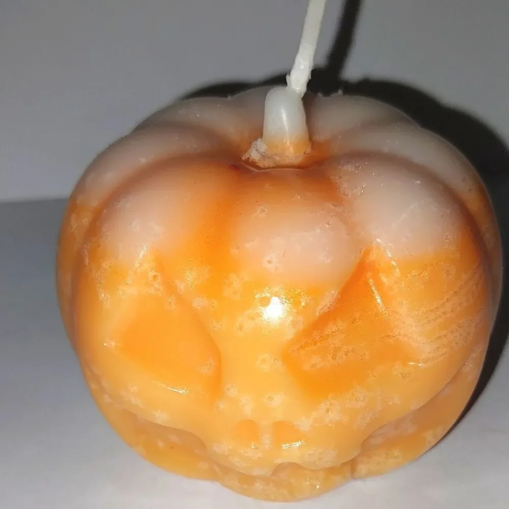 Hand crafted limited edition pumpkin candle from our spooky candle collection